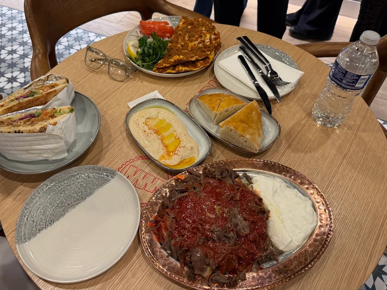 Iskender and hummus table spread